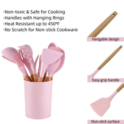 Le silicone antiadhésif faisant cuire l'ustensile de couleur a placé la trousse d'outils de cuisine