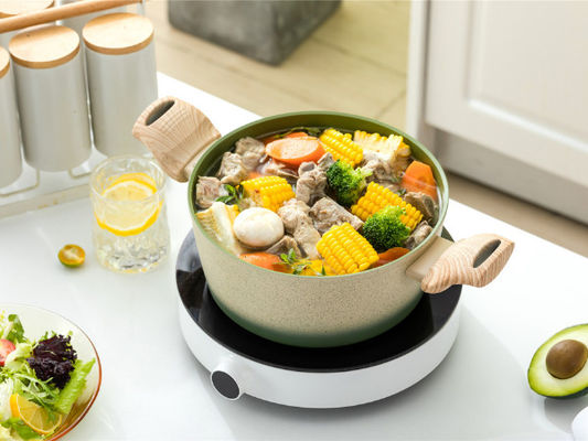 Cocotte en terre en aluminium résistante avec non l'intérieur de bâton